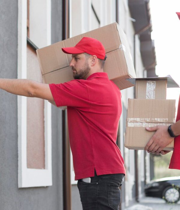 front-view-delivery-man-with-packagaes_23-2148684736